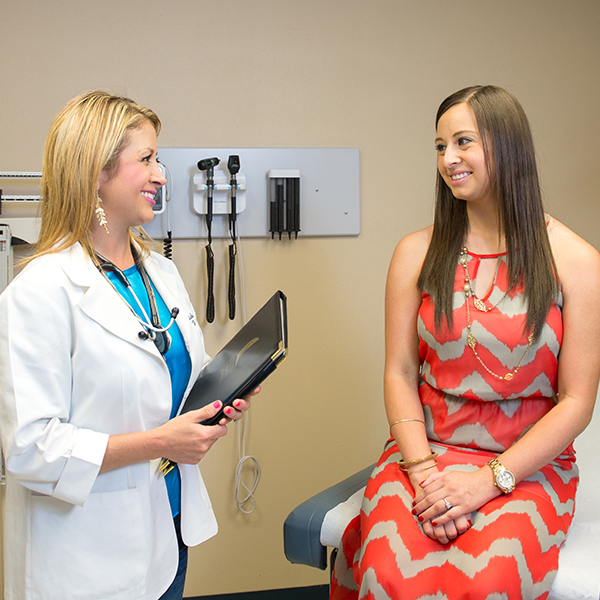 Nurse and patient in health center